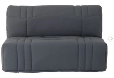 the back of a gray couch with a white button on it