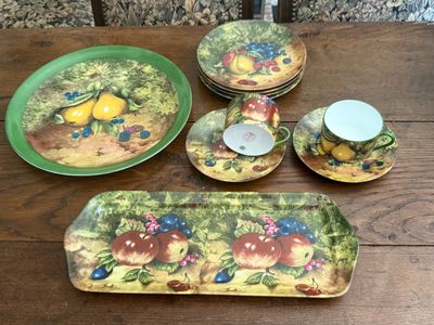 a lot of plates and cups on the table