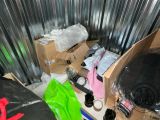 a pile of items sitting on a table in a room