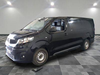 a picture of a black van on a checkered floor