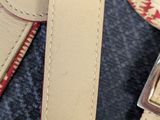 a red and white purse and a red and white purse