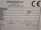 a picture of a scm group spa label on a machine