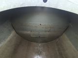 an image of the inside of a large metal container