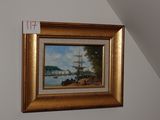 une image d'un tableau sur le mur d'une pièce