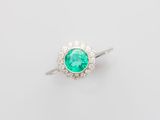 an emerald and diamond ring