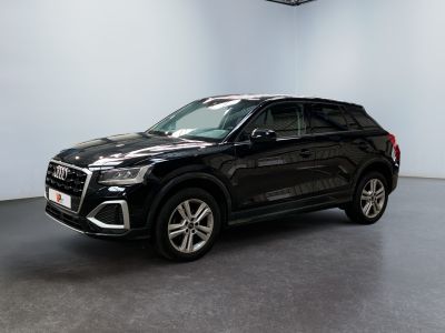 a black suv is parked in a large room