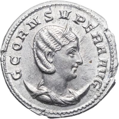 une pièce d'argent portant une tête de femme et une couronne