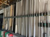 many tools hanging on the wall in the garage
