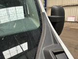 a close up of a car door with a sticker on it