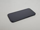 a close up of a cell phone on a table with a white background
