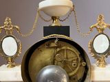 a clock that is sitting on top of a table