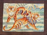 a picture of a picture of a tiger and a cat