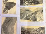 an old photo of a book with pictures of mountains and people on it