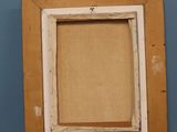 a picture of a picture frame on a shelf in a room
