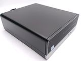 an image of a close up of a black computer on a white surface