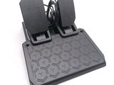 a pair of pedals that are on top of a stand