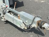 a machine that is sitting on the ground in the parking lot