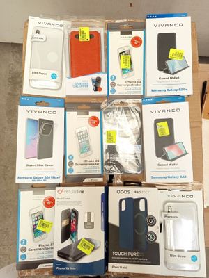 several boxes of cell phones are stacked on top of each other