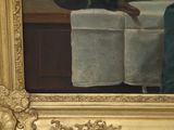 a painting of a cat sitting on a table next to a chair