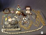 many different types of jewelry on the table