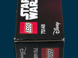 a box of lego star wars items on a blue background
