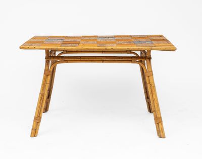 a bamboo table with a tile top and legs
