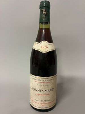 a bottle of wine that is sitting on a table