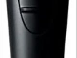 an image of a black electric shaver on a white background