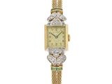 a lady ' s diamond and emerald watch