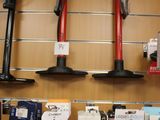 many different tools hanging on the wall in this store