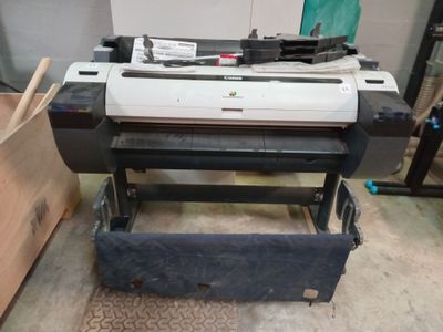 a large printer that is sitting on a table