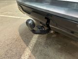 a close up of a car exhaust pipe on the back of a car