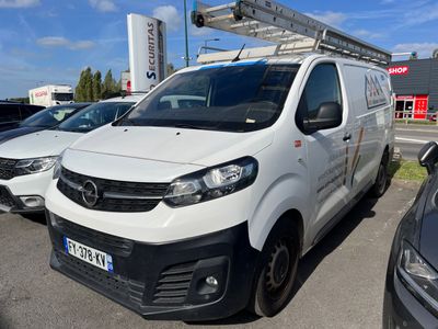 a white van that is parked in a parking lot
