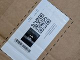 a box with a qr code on it sitting on a table