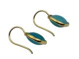 a pair of gold and turquoise earrings on a white background