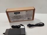 an image of a box with a charger and a power cord