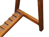 an image of a close up of a wooden table with a ladder