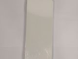 a piece of plastic that is sitting on a table