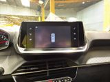 the dashboard of a car with a digital display in the center