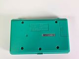 a green nintendo game console sitting on a white surface