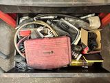 a box full of assorted items sitting on the floor