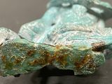 a close up of a piece of metal on a table