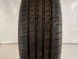a close up of a tire on a white surface