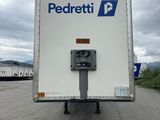 a delivery truck that is parked on the side of the road