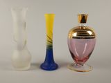 three vases sitting next to each other on a table
