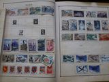 a book with stamps on the pages and a book with stamps on the pages