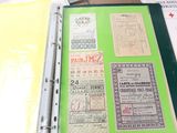 a binder that has a lot of different stamps on it