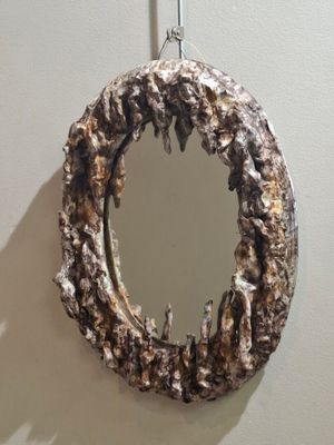 Miroir ovale en céramique émaillée à motifs de stalactites