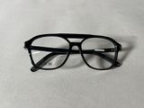 glasses on a table with a white surface and a white background