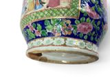 a vase that has a picture of a woman on it